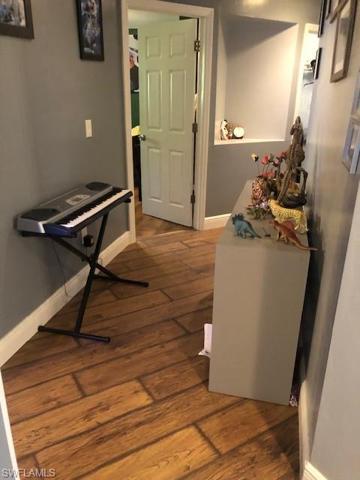 Wrap around hall way connects kitchen to guest rooms and laundry.