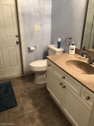 Guest bath opens to lanai.