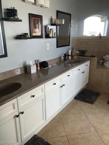 Extended double vanity in Master bath.