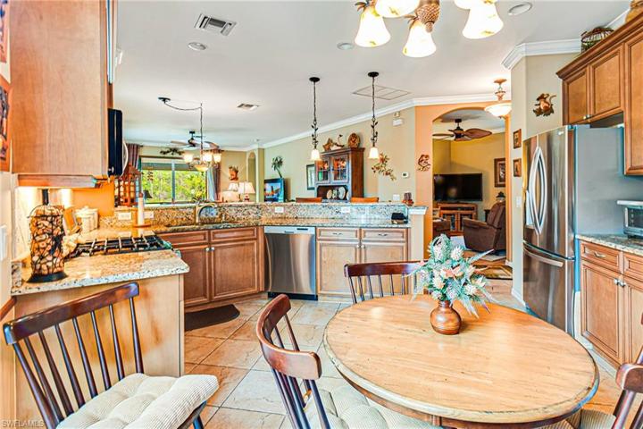 GREAT VIEW OF THE LARGE NUMBER OF CABINETS & UPDATED LIGHTING SHOWING OFF THE BEAUTY OF THE HOME!
