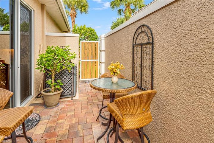BEAUTIFUL SIDE PATIO PROVIDES EVEN MORE ENTERTAINMENT & GRILLING AREA TO ENJOY!
