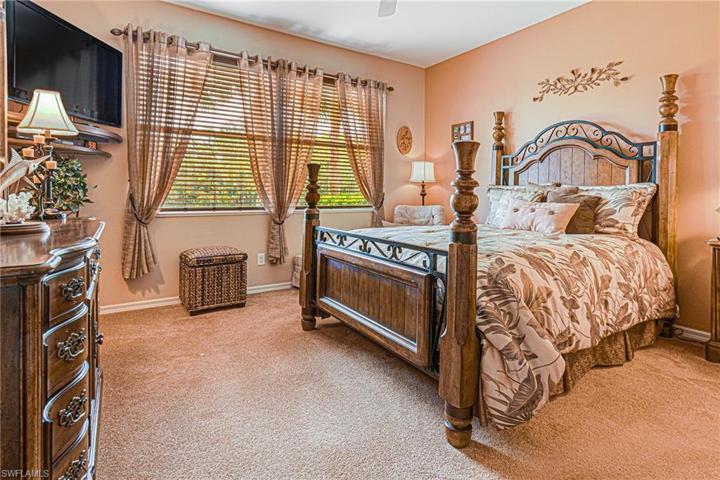 HUGE MASTER BEDROOM WITH A LAKE VIEW TO ENJOY!