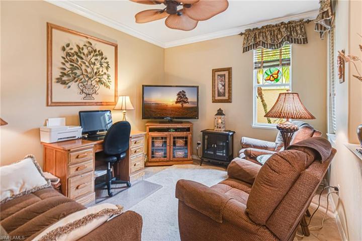 OFFICE/DEN IS HUGE & THE LOVE SEAT, 2 RECLINERS ALONG WITH THE SOLID OAK DESK W/ CHAIR; PLUS, THE CABINET W/ TV & THE 2 GLASS END TABLES & RUG ALL REMAIN WITH THE HOME! $$$$ SAVED!
