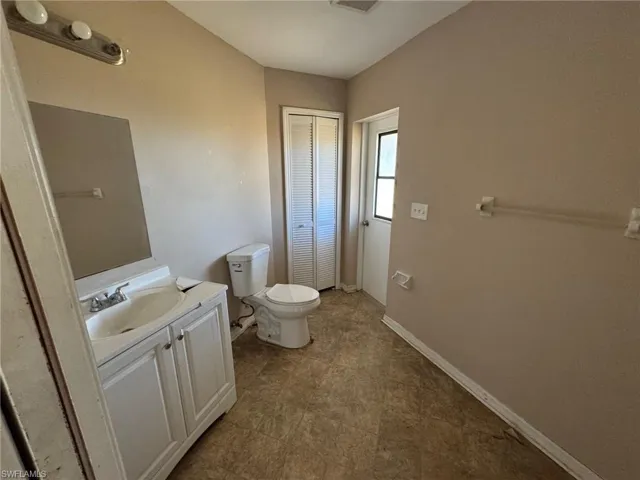 Utility room featuring water heater