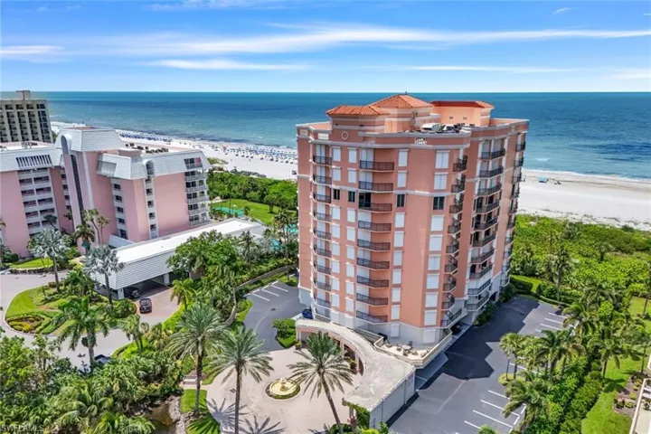 Bird's eye view with a water view and a view of the beach