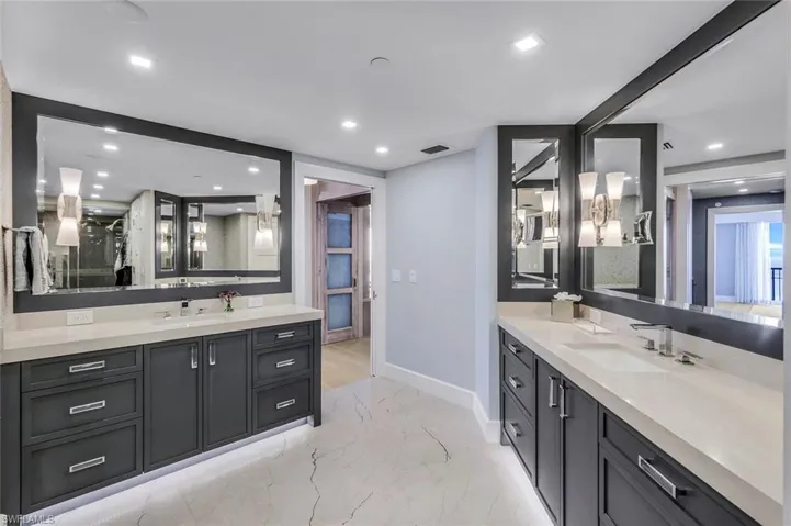 Bathroom featuring vanity and tile patterned flooring
