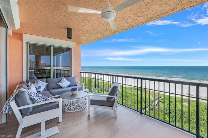 Balcony with a water view and outdoor lounge area