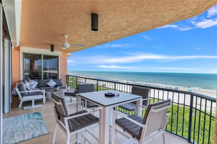 Balcony featuring a water view and an outdoor hangout area