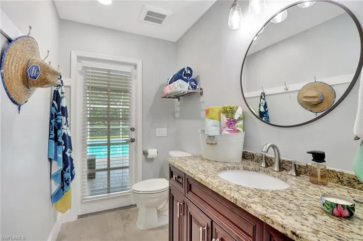 Bathroom with vanity and toilet