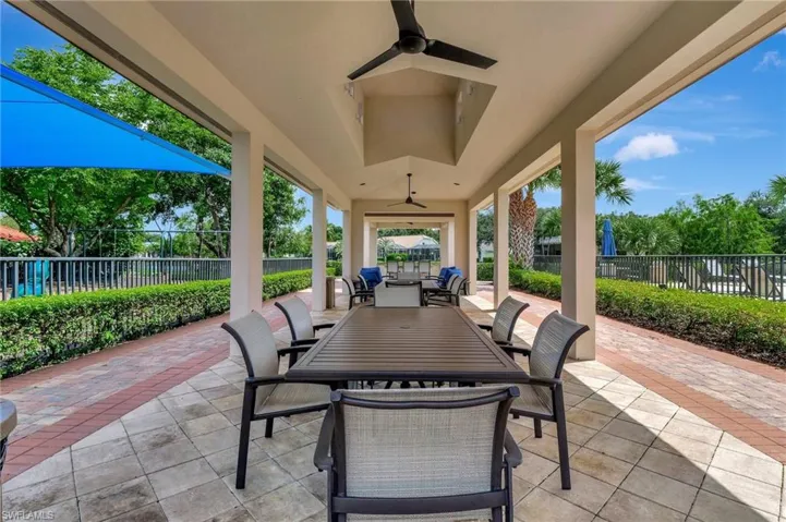 View of patio featuring ceiling fan and an outdoor hangout area