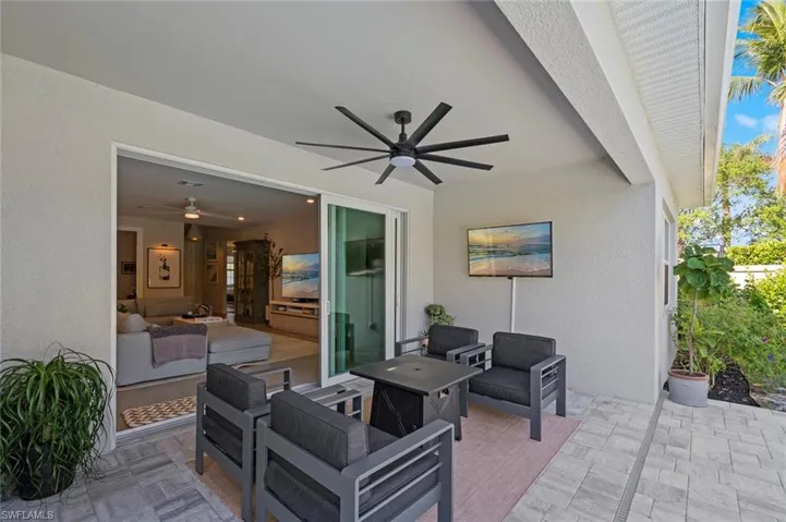 View of patio / terrace with outdoor lounge area and a ceiling fan