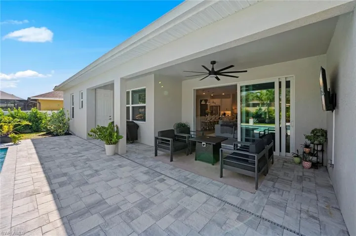 View of patio / terrace featuring a ceiling fan and an outdoor hangout area