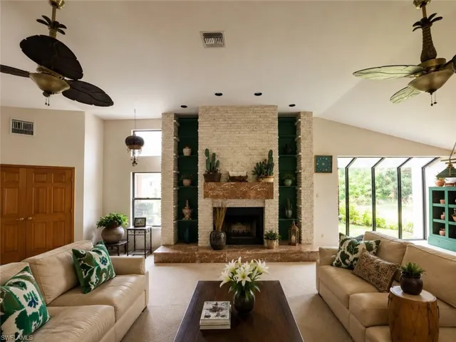 Digitally enhanced, Living room, just off of kitchen. Next to full size bar.