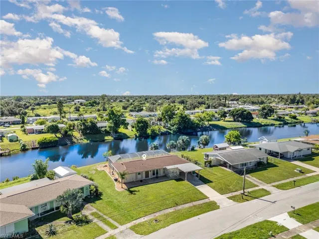 Aerial view of residential area with a nearby body of water