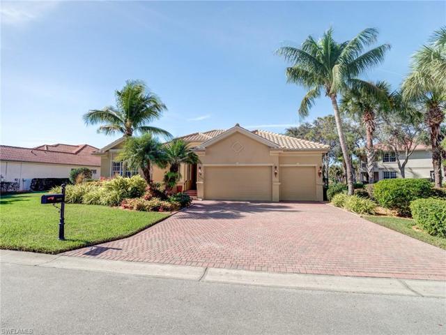 Large paver stone driveway and 3-car garage