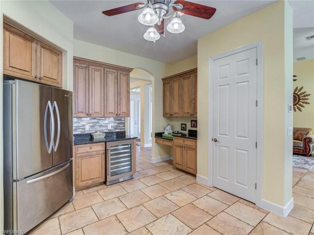 New wine cooler and desk to the right.  Dining room through that opening