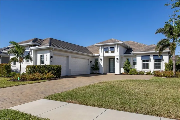 This stunning 4 bedroom home in Naples Reserve has been upgraded to the max - it even comes  with a private dock