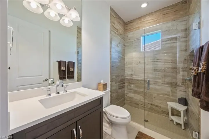 Second full bathroom located between the second and third bedrooms