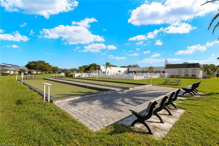 View of community featuring a lawn