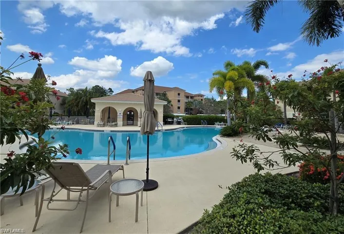 View of swimming pool with a patio area