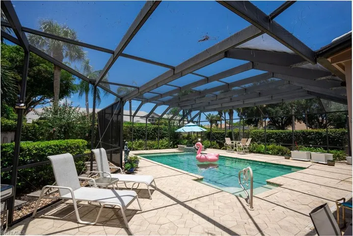 Expansive outdoor living of pool, patio and a lanai
