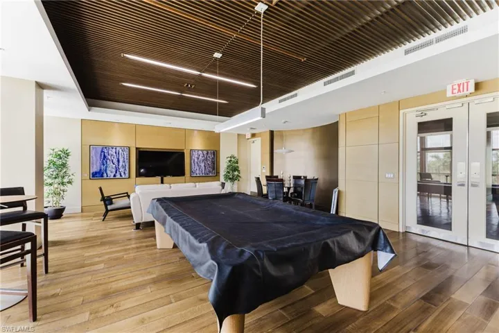 Recreation room with french doors and billiards