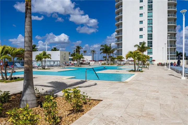 Community pool featuring a patio area