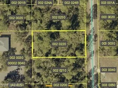 Aerial map of property and surrounding area featuring property boundaries highlighted