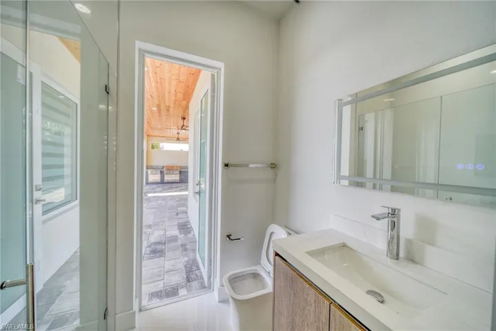 Bathroom with toilet and vanity