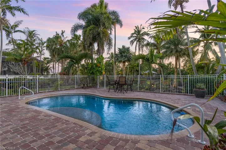 View of pool featuring a fenced in pool, fence, and a patio