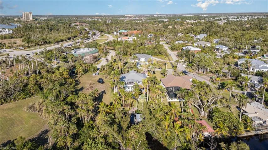 Aerial view with a residential view and a water view