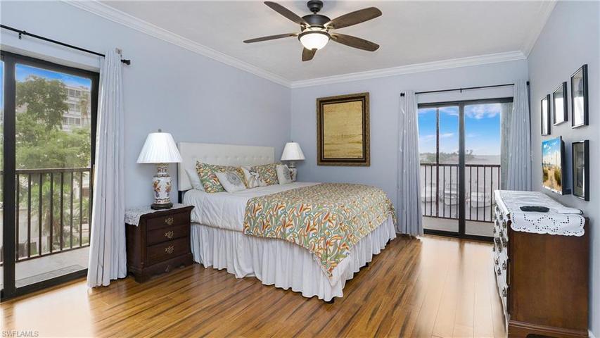 larger primary with 2 balconies, water view