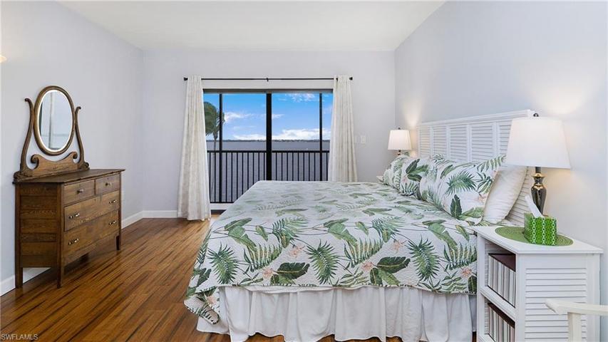 smaller of the 2 primary bedrooms- river view