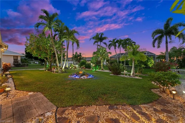 View of yard at dusk