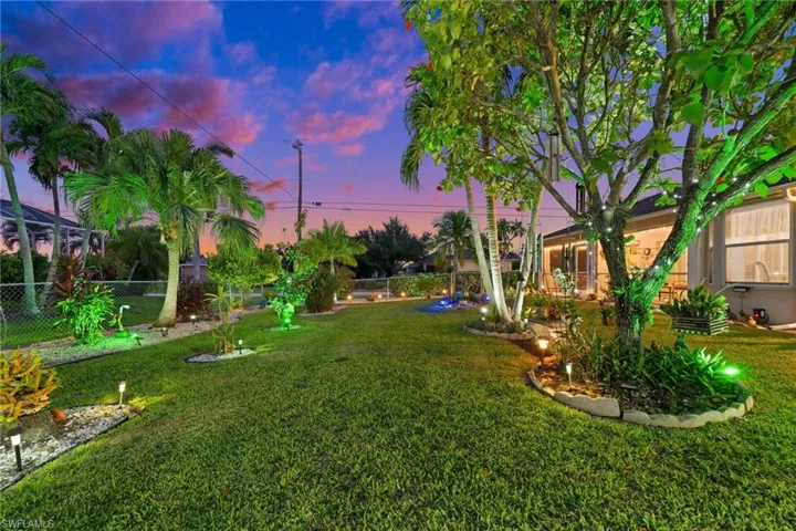 View of yard at dusk