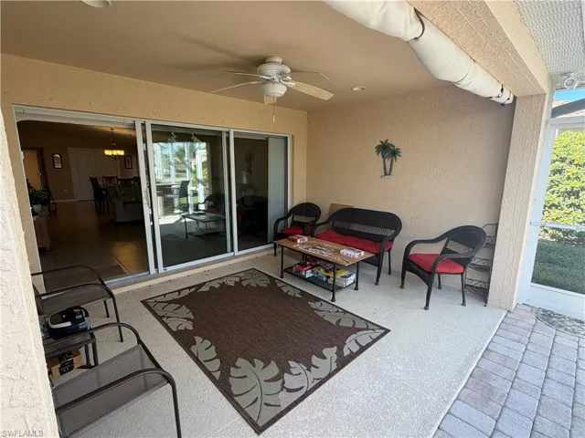 View of patio / terrace featuring a ceiling fan and an outdoor hangout area