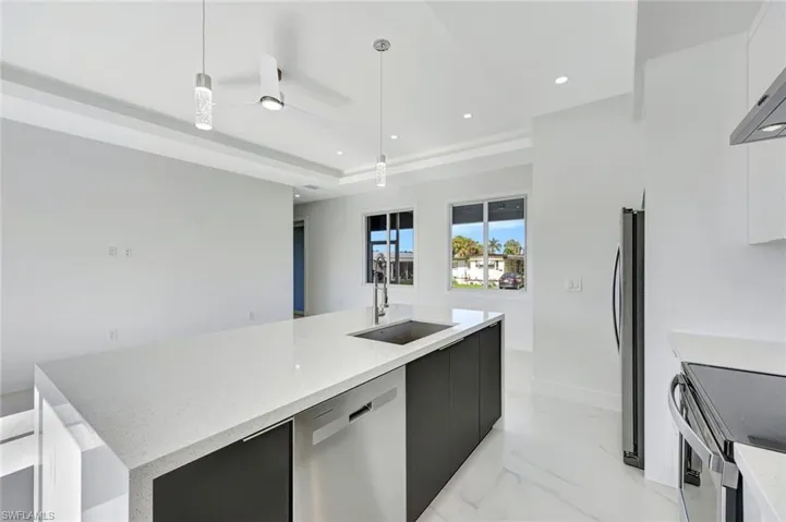 Kitchen is open to living area.