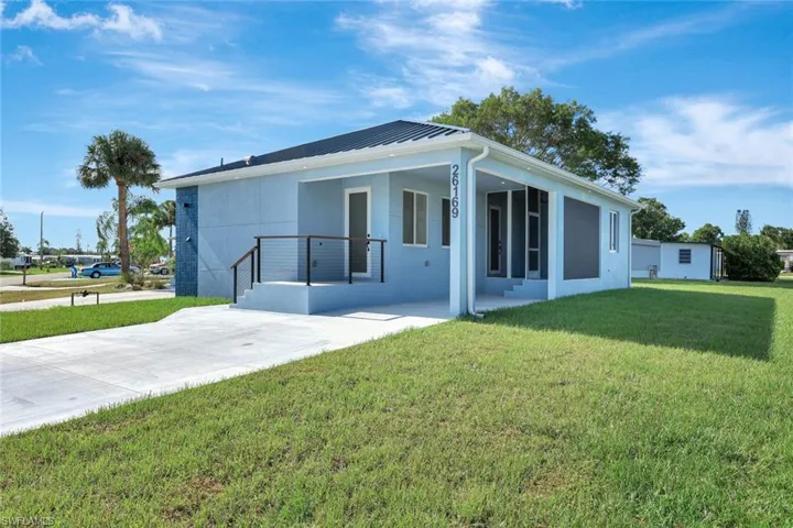 Home features a LARGE carport.