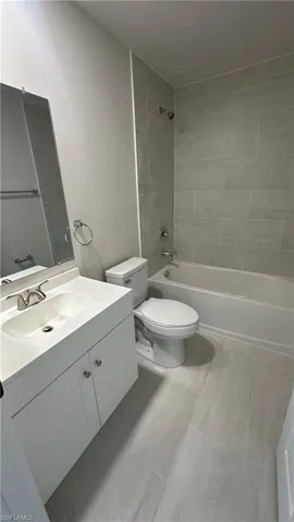 Full bath with vanity and bathing tub / shower combination