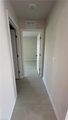 Hallway with baseboards