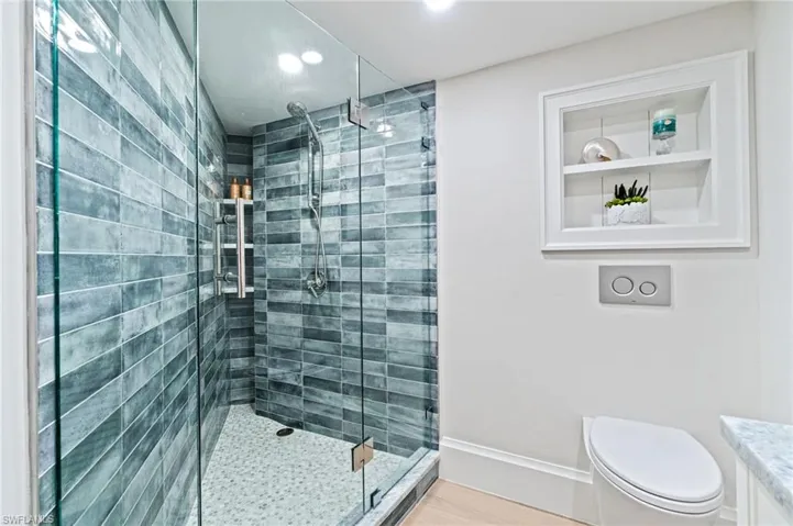 Guest Bathroom showing the walk in shower and Toto Toilet