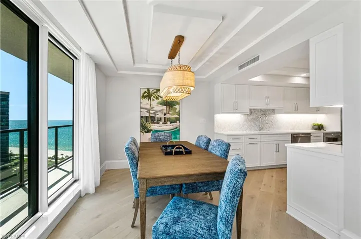 Dining space has views of the Gulf and access to the balcony