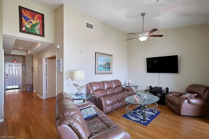 Living room with vaulted  ceiling