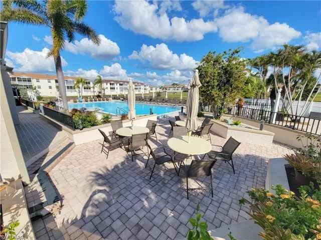 Community pool with a patio area