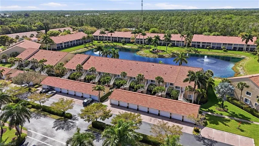 Bird's eye view of a large body of water and apartment complex / building