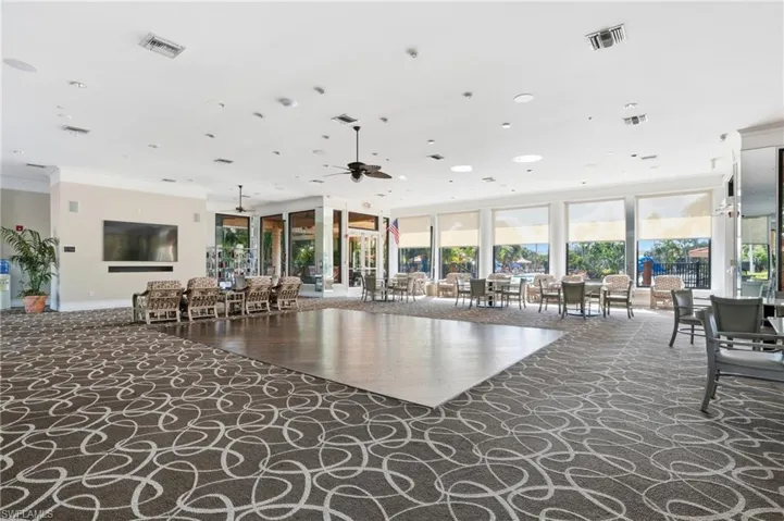 Common area featuring crown molding and recessed lighting