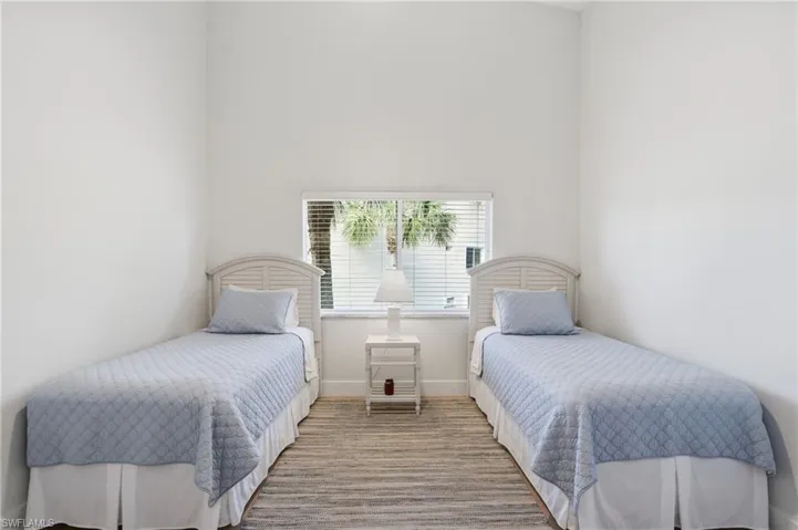 Bedroom with baseboards