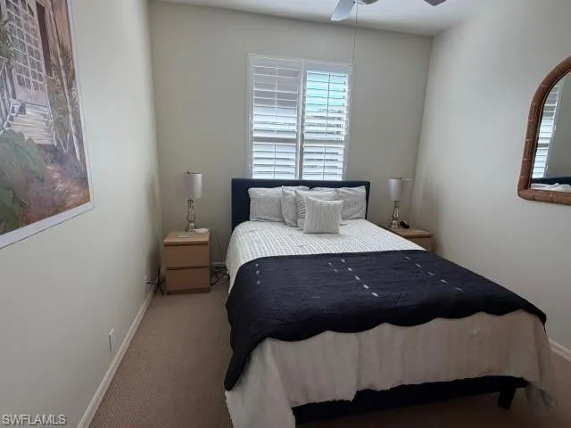 Bedroom featuring carpet floors and a ceiling fan