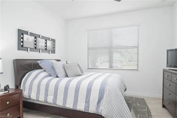 Bedroom featuring light tile patterned floors