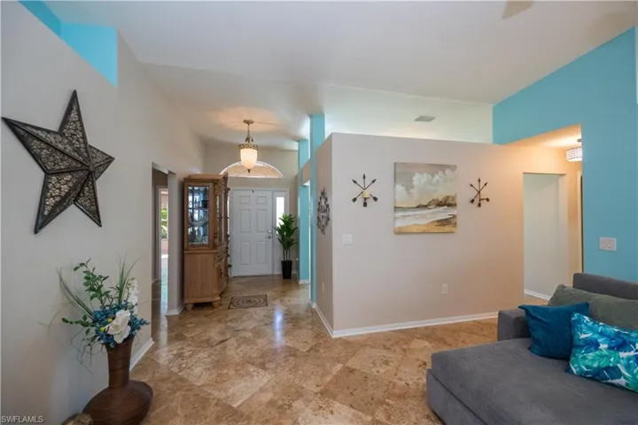 front entrance hallway to master to right and 3 guest bedrooms to the left